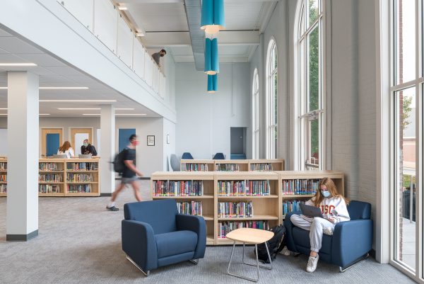 comfortable chairs and bookstacks in the library